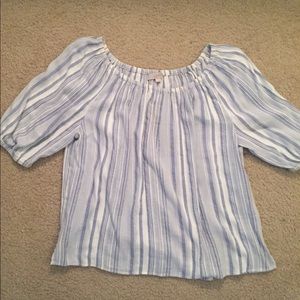 Off-the-shoulder blue and white striped blouse